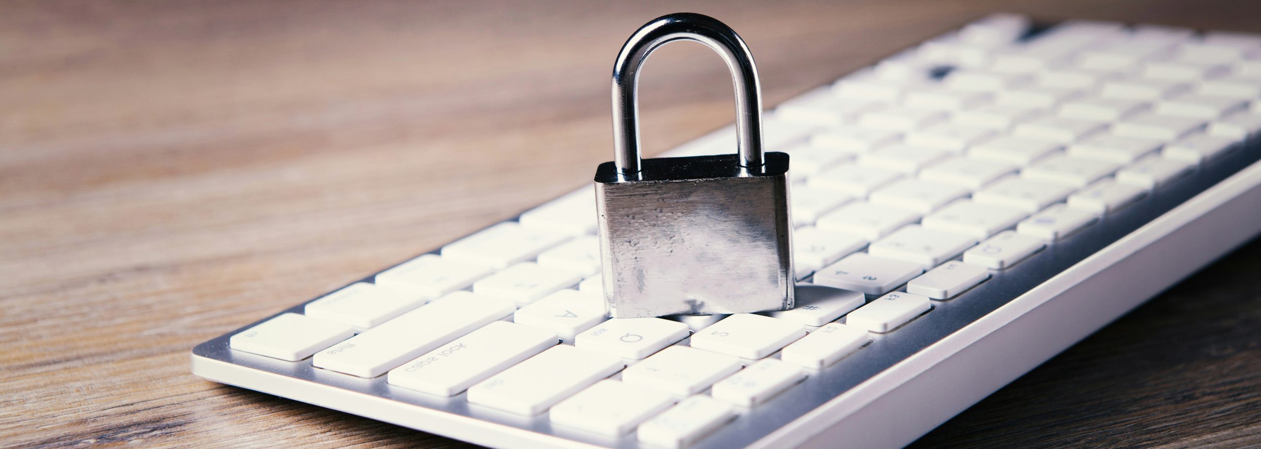 padlock on top of a computer keyboard